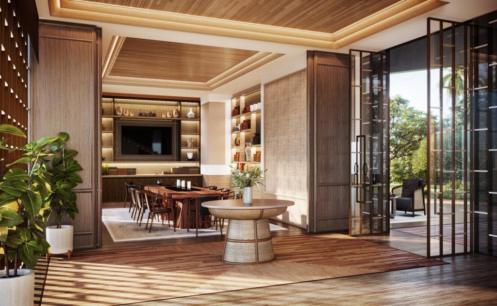 The serene and artistic entrance of a modern luxury hotel, hinting at the upcoming Aman Nai Lert Bangkok.