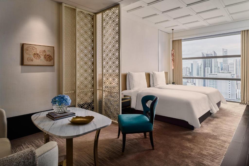 The striking silhouette of Rosewood Bangkok, inspired by the Thai 'wai' gesture of greeting.